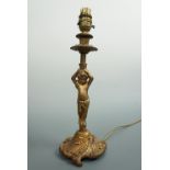 A vintage figural brass table lamp, 30 cm (excluding socket)