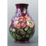 A Moorcroft vase, 19 cm high, W M