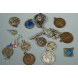 A quantity of vintage religious pendants etc