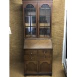 A George V mahogany bureau bookcase