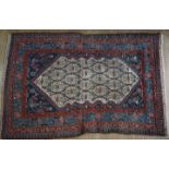 An oriental rug, 195 cm x 130 cm
