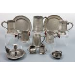 A collection of 19th Century and later pewter including a Quart tankard and two single-reed plates