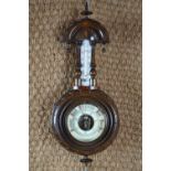 A Victorian banjo barometer, 42 cm high