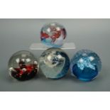 Four Caithness paperweights including Moonflower and Splash Down