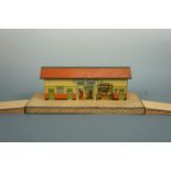 A Hornby tinplate model railway station platform, 43 cm x 15 cm