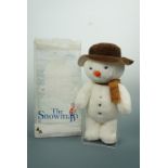 A vintage 1980s boxed "The Snowman" plush toy based on Raymond Briggs' book of the same name