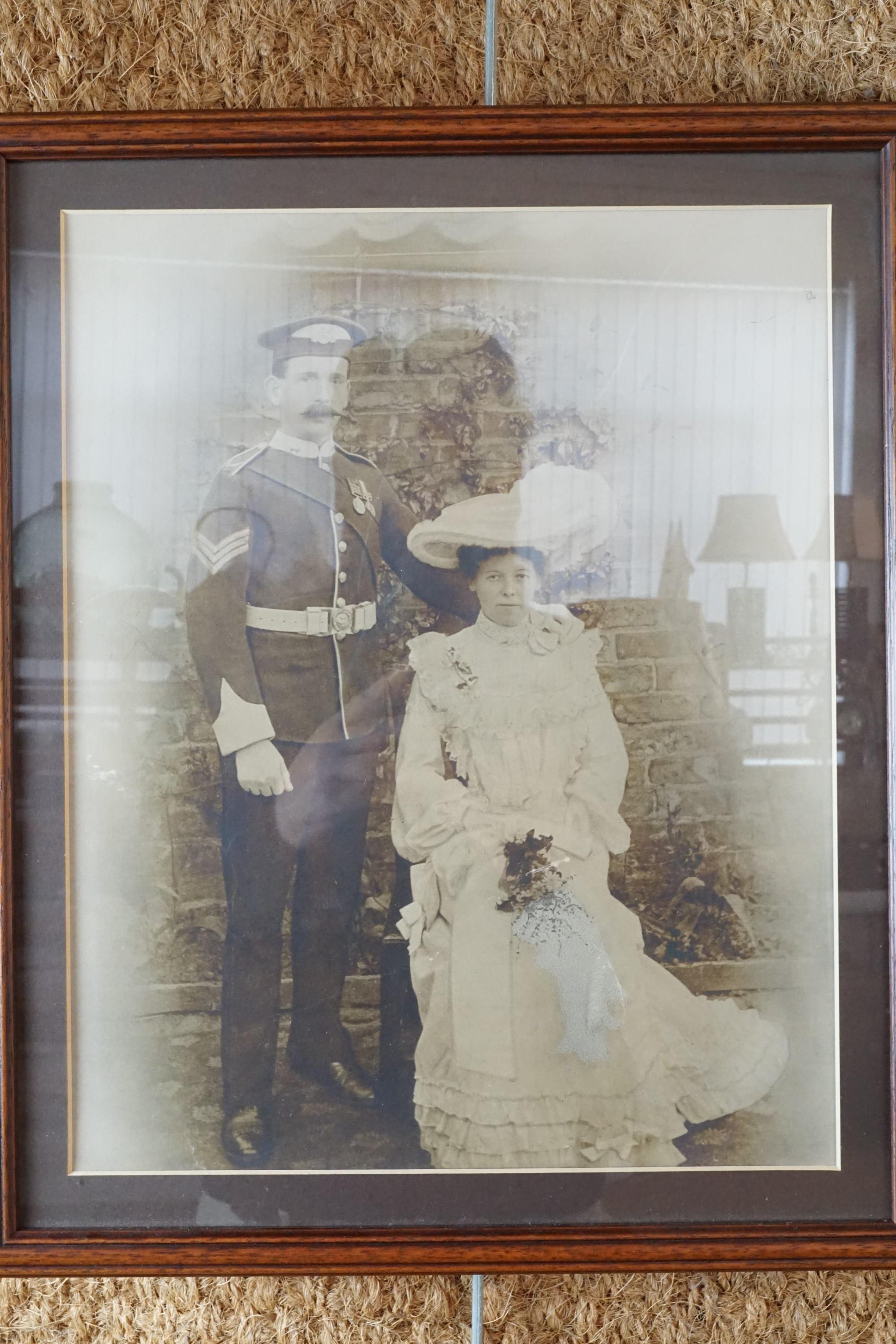 A framed pre Great War photograph of a British soldier wearing a Broderick cap, a framed 1918 army - Image 12 of 16