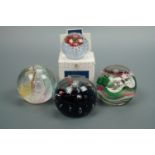 Four Caithness paperweights including Extravaganza and Daydream