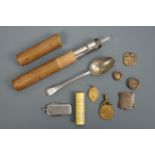Sundry collectors' items including a 19th Century watch chain fob, a "Bung Club" brass tag, a