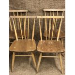 Four Ercol beech wood dining chairs