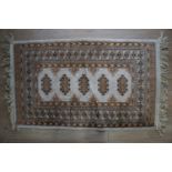 An oriental rug, 120 cm x 70 cm