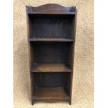 A 1930s oak diminutive bookcase, 38 cm x 94 cm