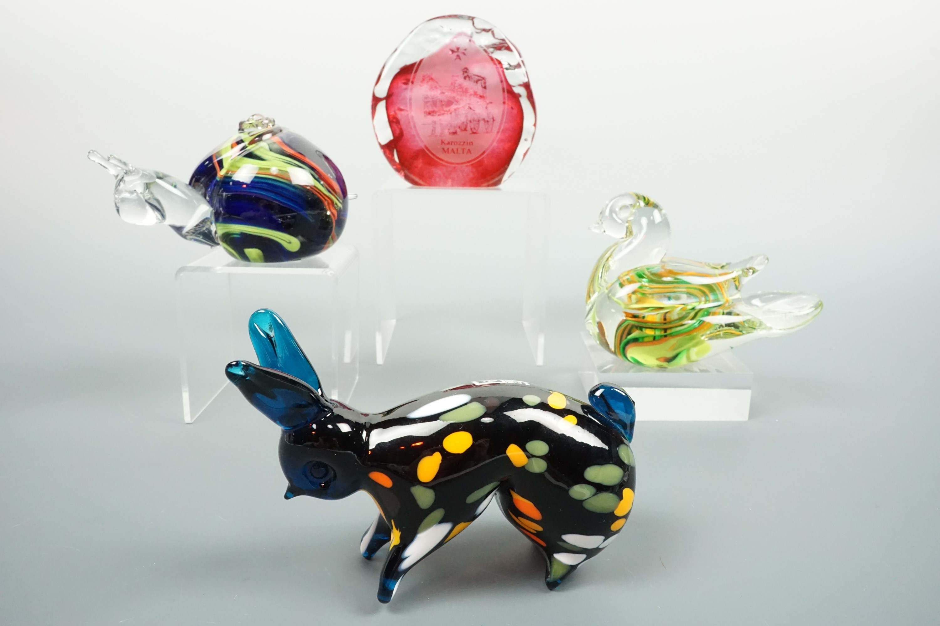 Three Mdina glass paperweights modelled respectively as a snail, a rabbit and a duck, together