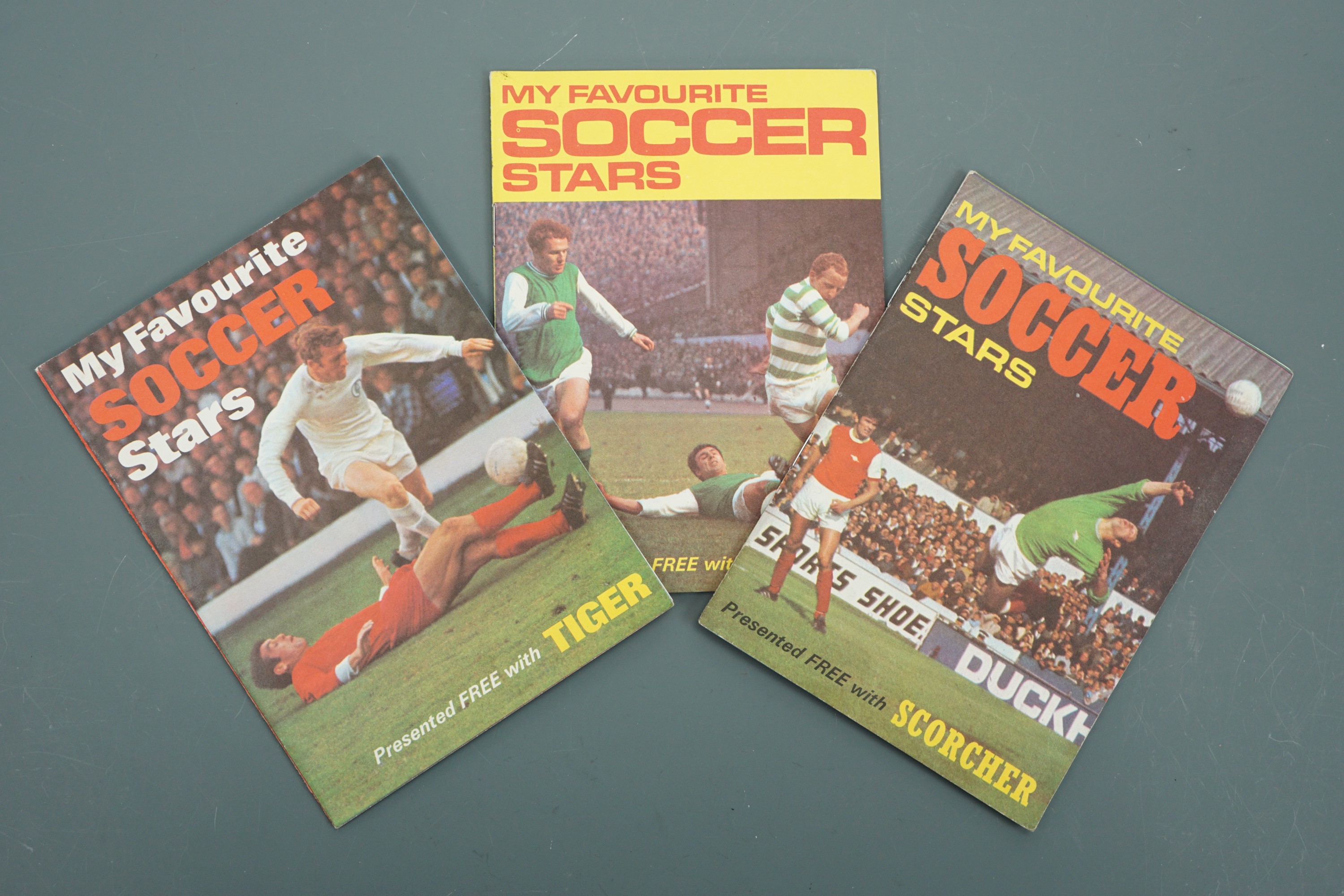 Three 1970 "My Favourite Soccer Stars" football card albums and cards as presented with Lion,