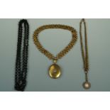 A Victorian large paste-set rolled-gold pendant locket and collar neck chain together with a faux-