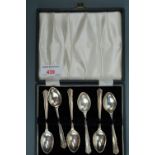A cased set of six Elizabeth II silver teaspoons, with shaped stems, Sheffield, 1963, 72.7g