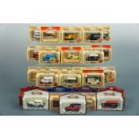 Thirty boxed die-cast cars and vans including Evening Standard bus and Outspan