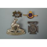 A Victorian military prize fob medallion, an HMS Vengeance sweetheart brooch, a South African cadets