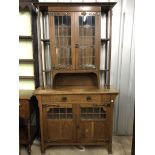 A late 19th / early 20th Century Arts and Crafts oak dresser, 122 cm x 217 cm