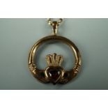 A 9 ct gold and garnet Gaelic claddagh type pendant and 9 ct gold fine link neck chain, pendant 2
