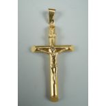 A contemporary Italian yellow metal pendant crucifix, marked 9K, 3.5 cm, 0.8 g