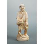 A Meiji Japanese carved ivory okimono depicting a cheery fisherman, character mark to base, 13 cm