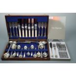 Boxed Guy Degrenne fish eaters and a cased canteen of cutlery