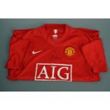 A signed Manchester United player's shirt, that of Quinton Fortune and signed at the Stretford