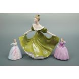 A Royal Doulton figurine Lynne, HN 2329, together with Coalport figurines, Holly and Joanne