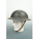 A Second World War Civil Defence helmet
