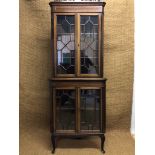 A late Victorian inlaid mahogany astragal glazed floor standing corner cabinet, 204 cm
