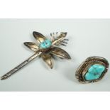 A turquoise and white metal brooch in the form of a stylized dragonfly, possibly Mexican, 6 cm,