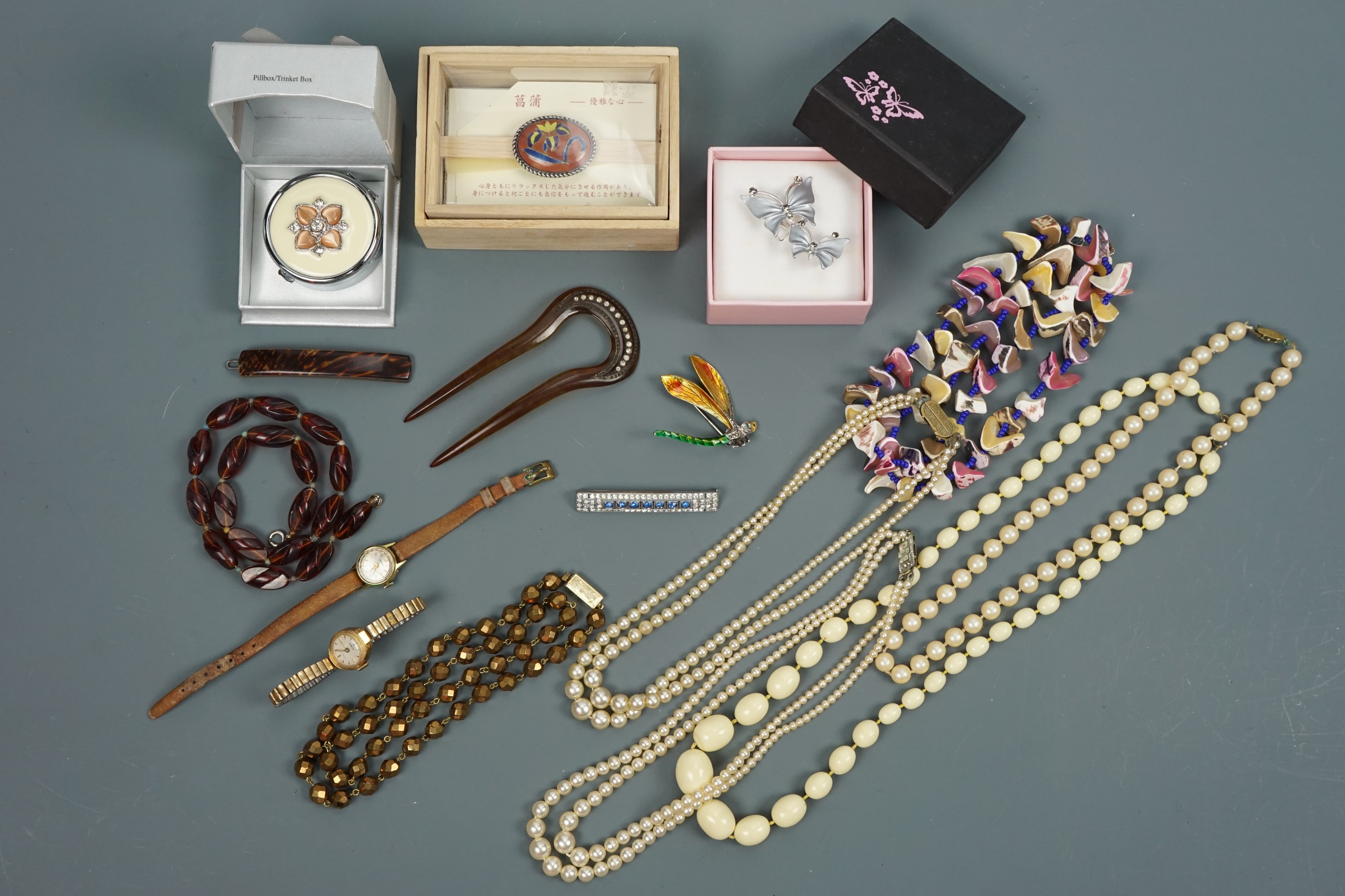 A quantity of vintage costume jewellery and watches together with a boxed Edinburgh Woolen Mill