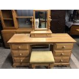 A contemporary pine dressing table, mirror and stool
