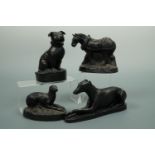Four E & J Mining "coal" figurines of animals