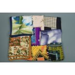 A collection of vintage designer and other silk scarves, including Aquascutum, Aesotica, Adrienne