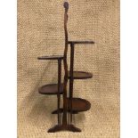 A 1920s mahogany folding cake stand