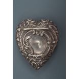 A late Victorian silver heart-shaped patch or similar box, each face relief-decorated in a rococo