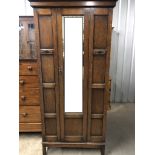 A 1940s oak single wardrobe