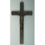 A late 19th / early 20th Century bronze and oak crucifix, 31 cm