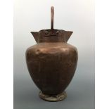 A copper milk churn, 37 cm