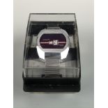 A mid 1970s Swiss Chromatic digital mechanical wristwatch, in stainless steel with bracelet strap,