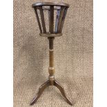 A tripod jardiniere stand, 83 cm