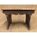 An antique child's oak stool, 34 cm x 20 cm x 25 cm