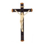 Escuela española, s.XVIII. Cristo crucificado. Escultura en marfil tallado sobre cruz en madera.