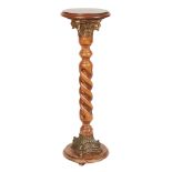 Peana-columna circular en madera de haya y bronce.