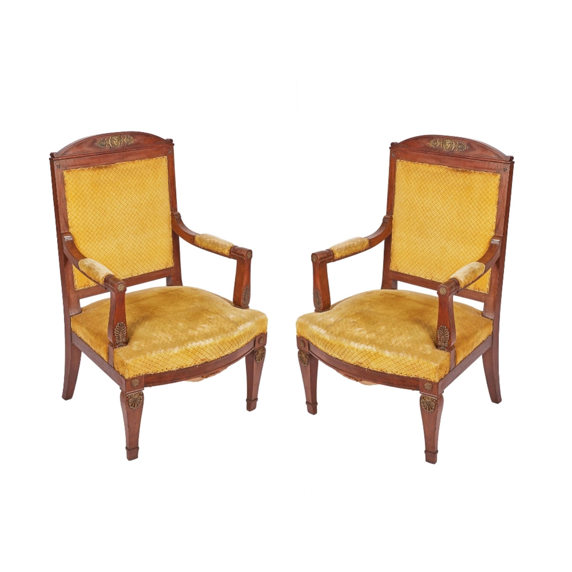 Pareja de sillones estilo imperio en madera de caoba y aplicaciones en bronce, ppios. del s.XX.