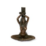 Escuela francesa, fles. del s.XX. Sumisa. Escultura en bronce patinado.