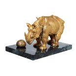 Salvador Dalí. Rinoceronte vestido con encajes. Escultura en bronce dorado al oro fino.