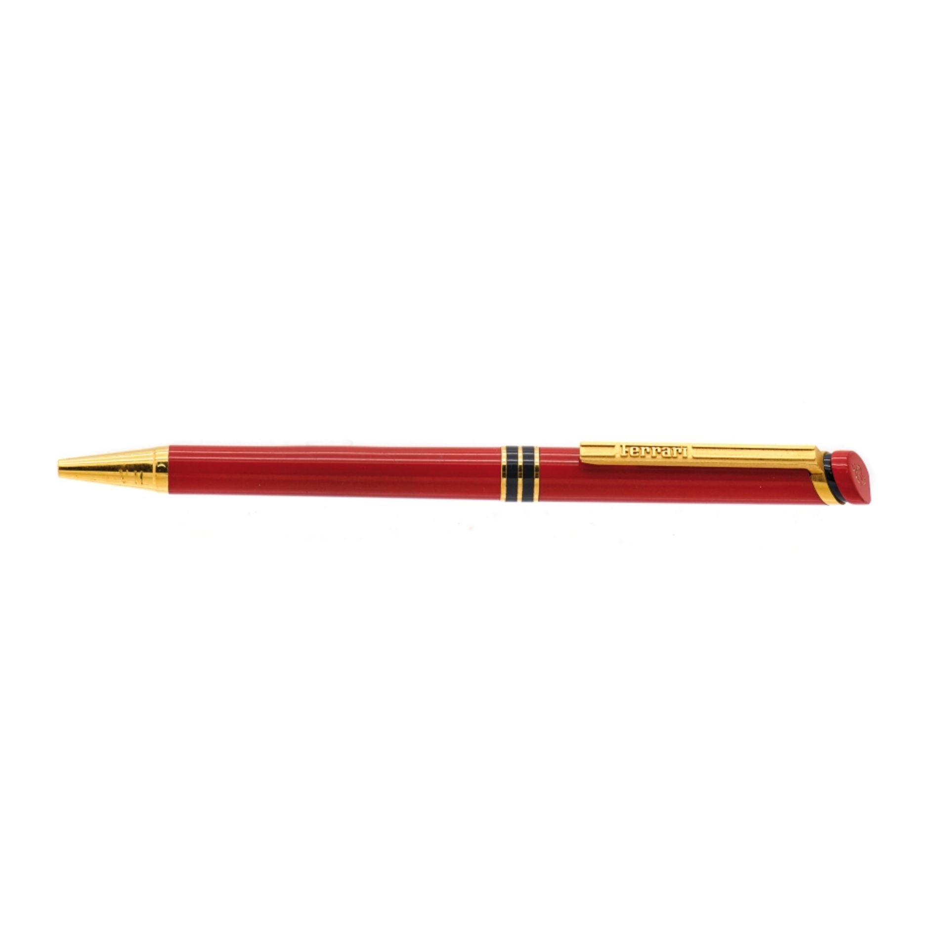 Bolígrafo Cartier "Aurora"-"Fórmula Ferrari" en laca negra y roja y plaqué oro, c.1980.